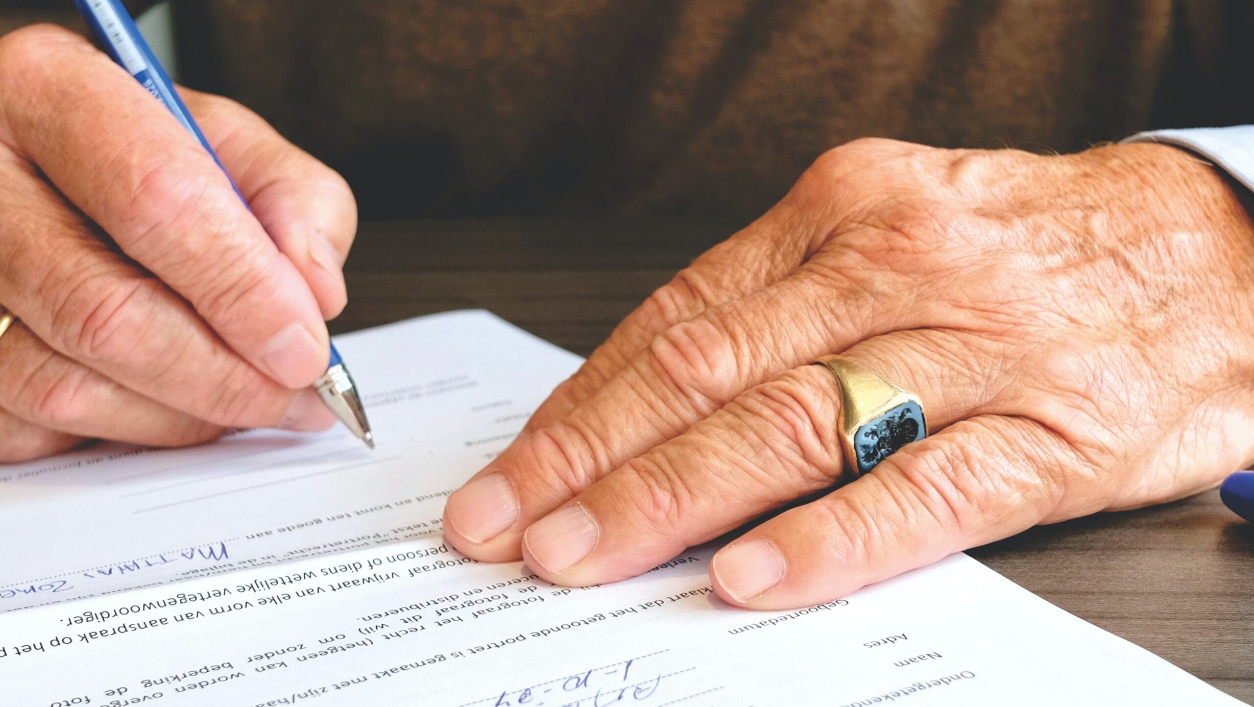 A person signs a contract