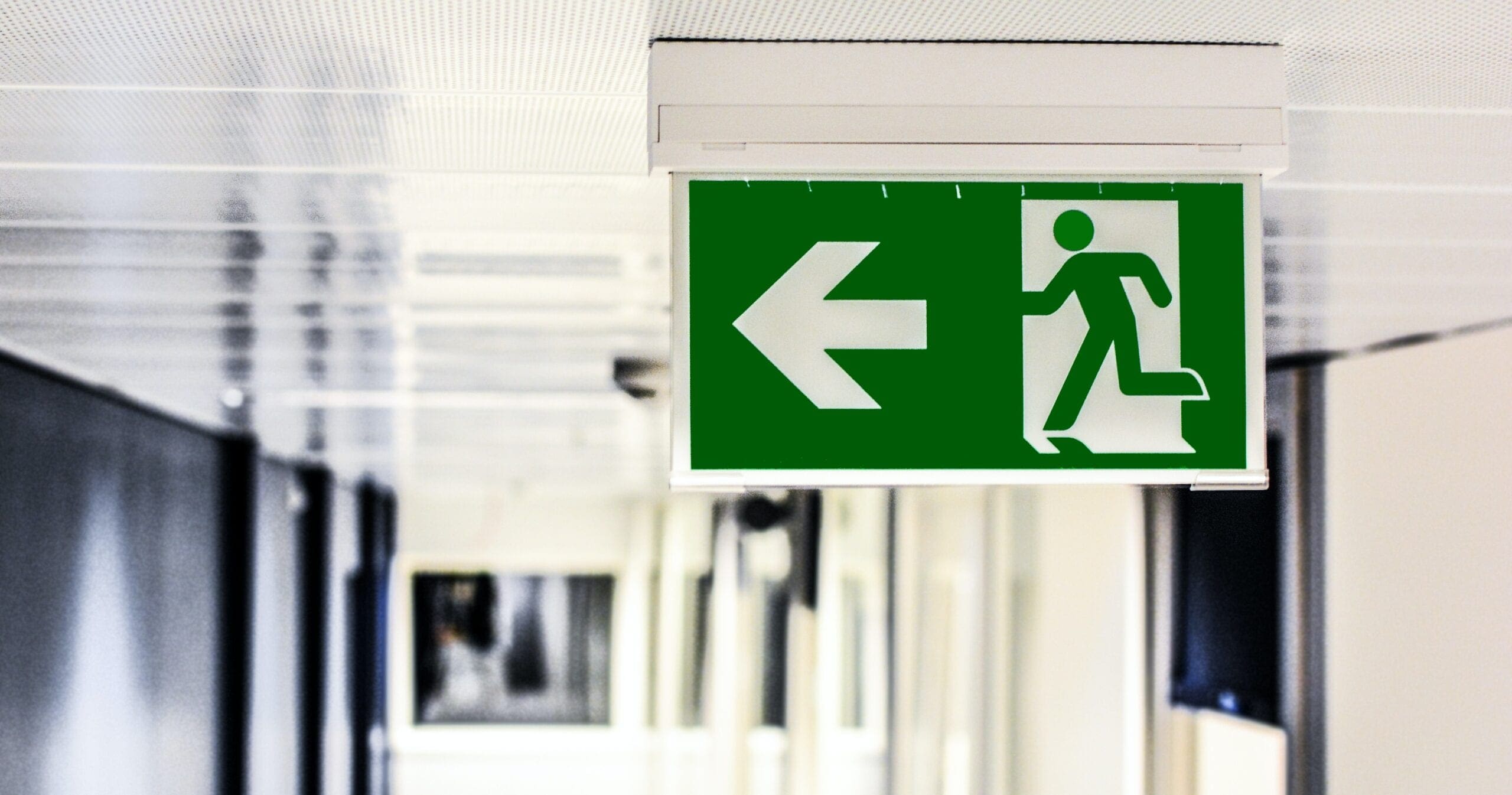 Closeup of an exit sign in a building